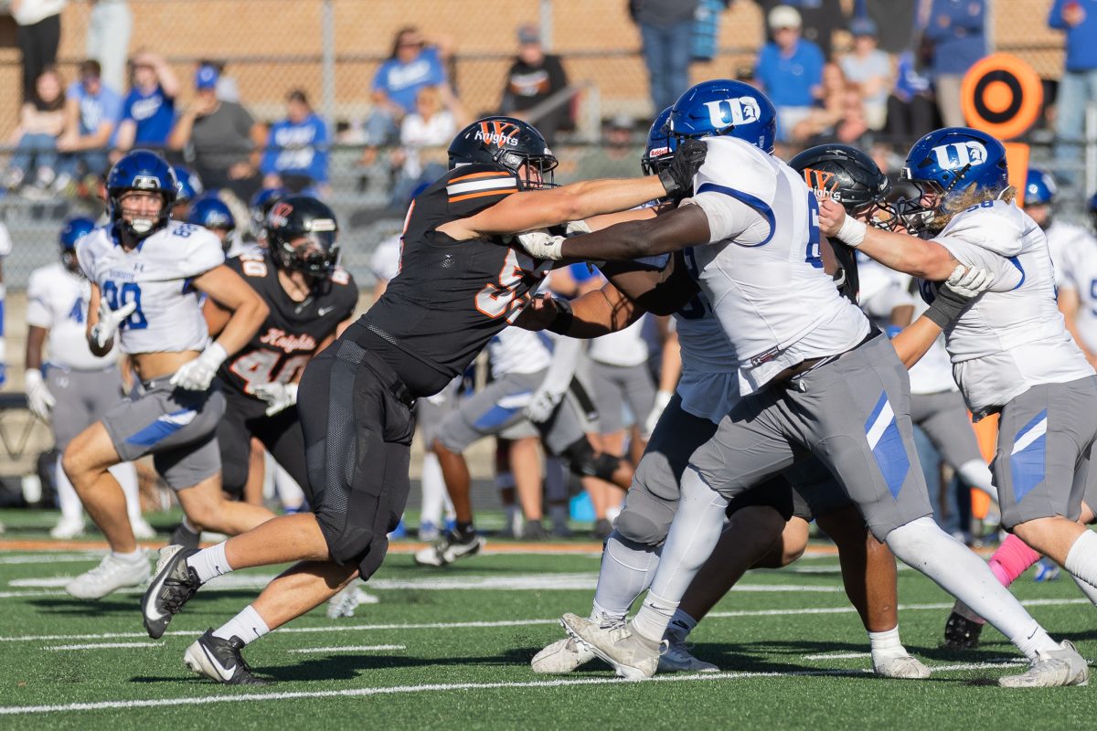 The Wartburg Knights Football team face off against the University of Dubuque Spartans on Oct. 11. Photo courtesy of Ali Parkhurst, Marketing & Communication and The Wartburg Trumpet.